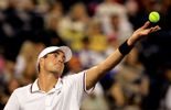 123 Isner sort Simon et va en demis